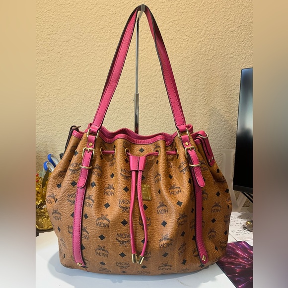 MCM Handbags - MCM COGNAC VISETOS WITH PINK LEATHER ACCENTS DRAWSTRING SHOULDER BAG